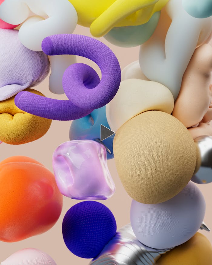 Vibrant 3D composition of abstract shapes in an array of colors, showcasing digital artistry.