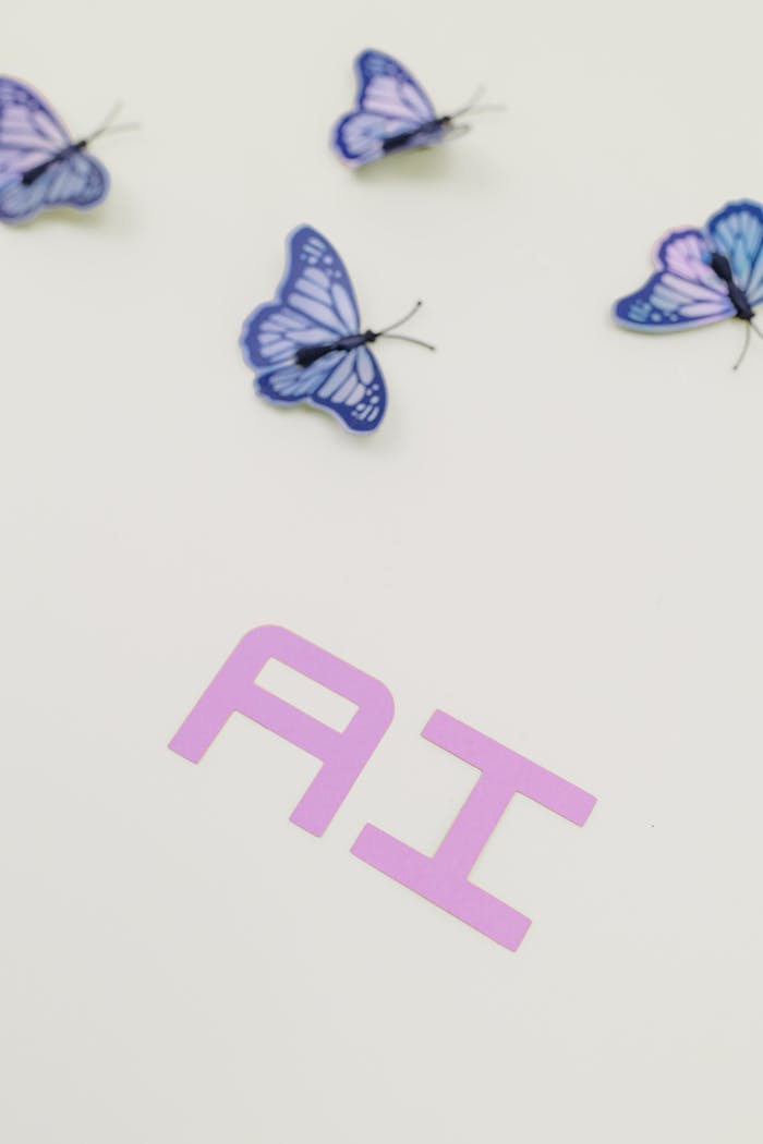 Purple letters 'AI' with artistic butterfly pattern on white surface, symbolizing futuristic technology.